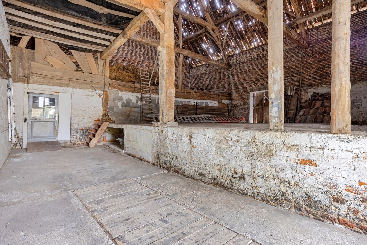 Prachtige 18e-eeuwse hoeve in Maasstijl gelegen in de dorpskern van Ophoven op een perceel van 27a50ca, genaamd "Huize Reynders".  foto 28