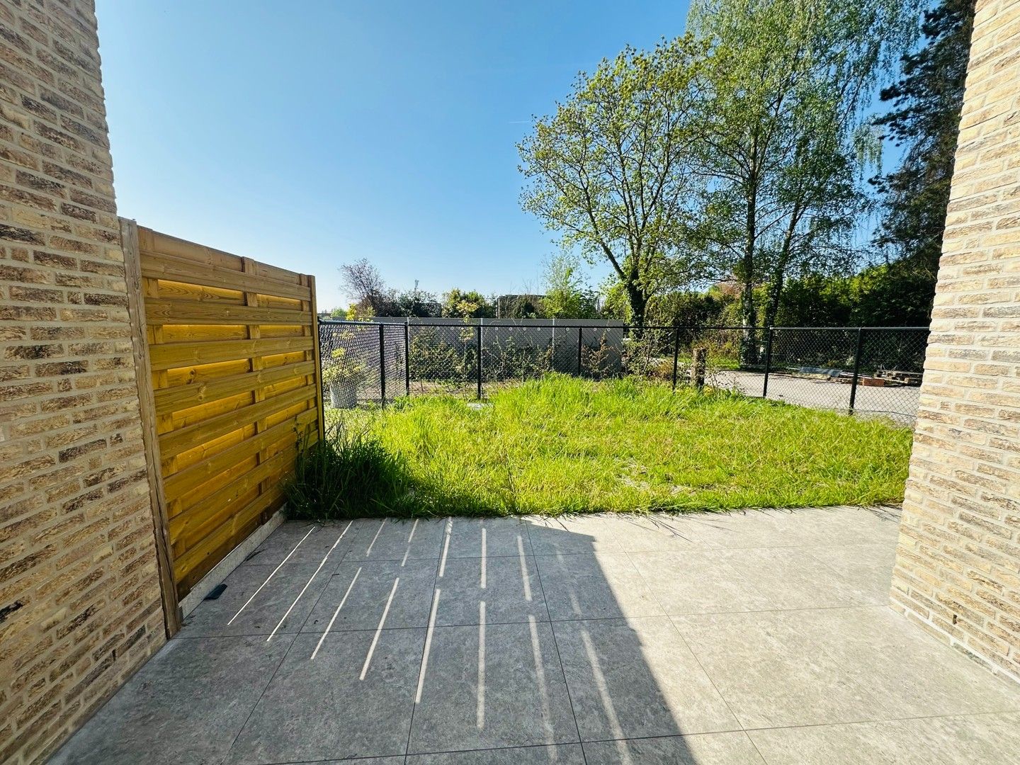 Nieuw gelijkvloers appartement met tuin en garage foto 9