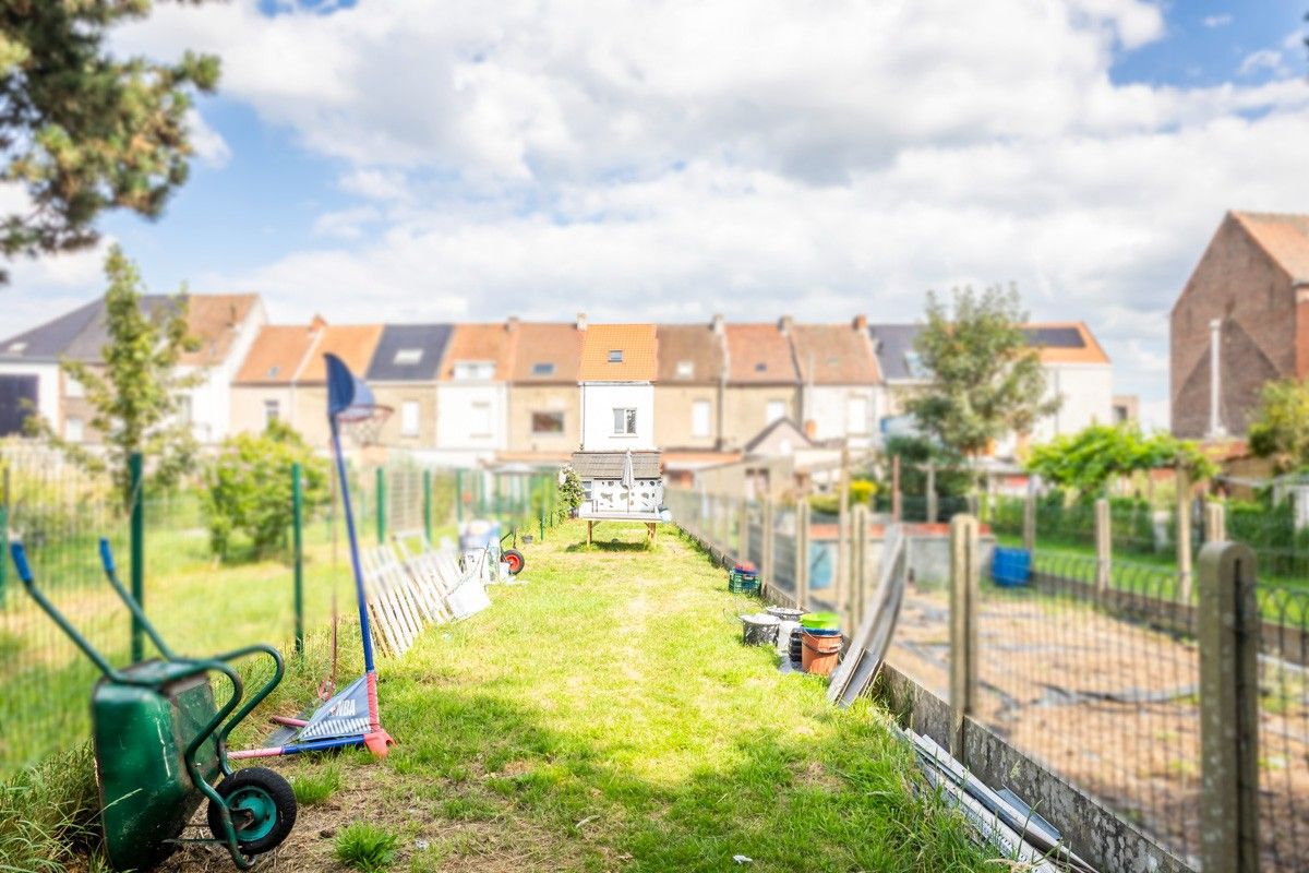 Comfortabele gezinswoning met drie slaapkamers en tuin foto 1