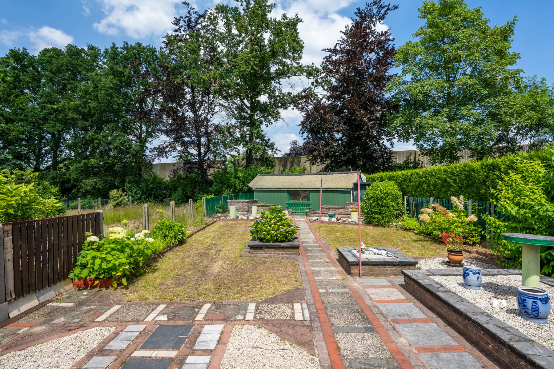 Te renoveren halfopen bebouwing met tuin en garage foto 19