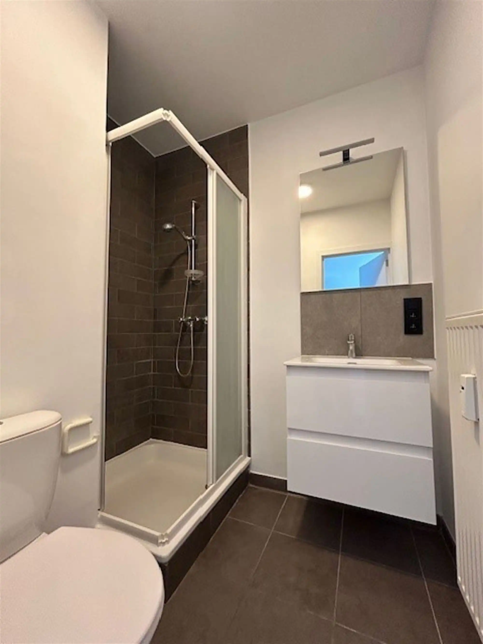 Zeer ruime studio (32m²) Tiensestraat Leuven foto 4