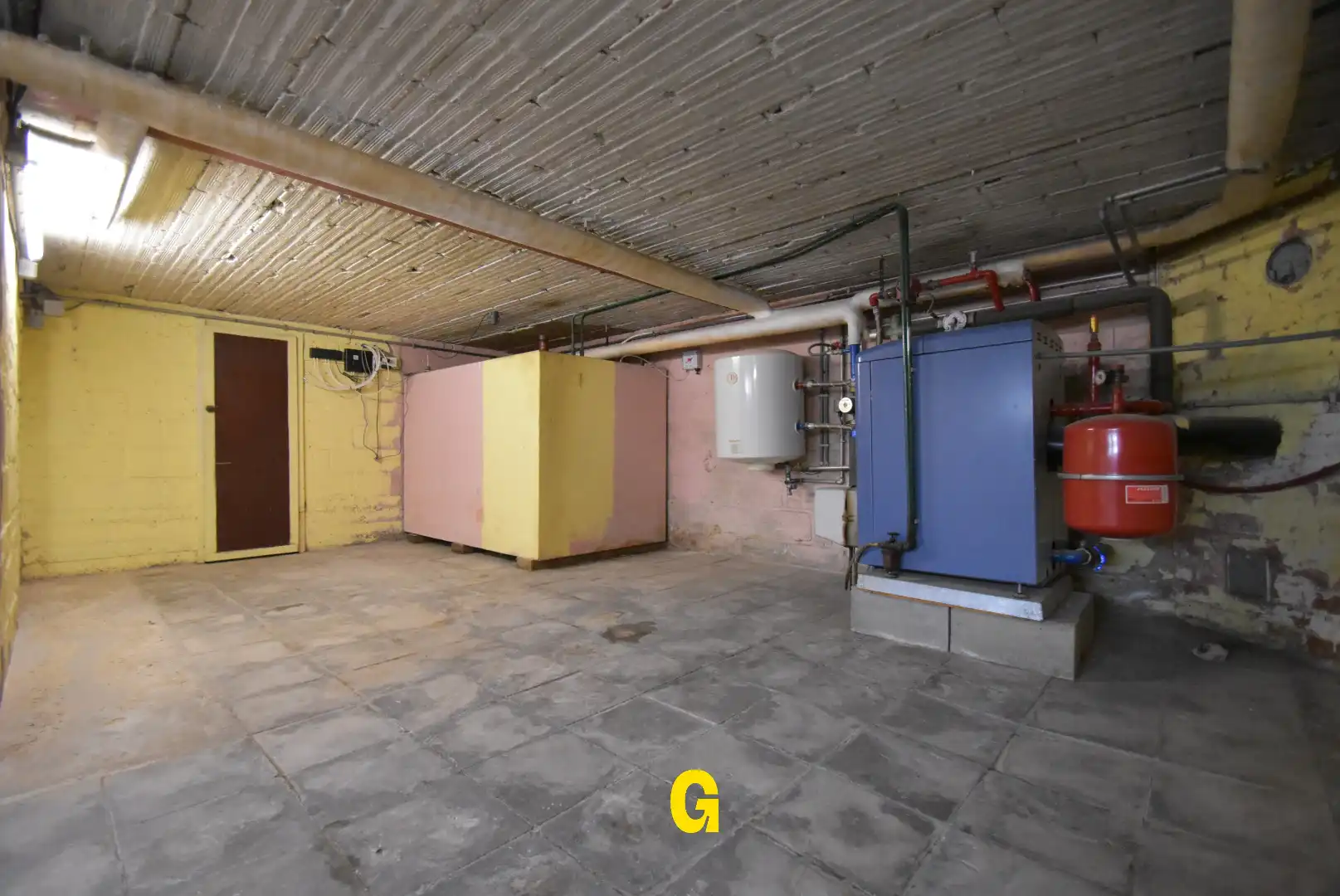 Halfopen woning met drie slaapkamers, tuin en twee garages in hartje Bilzen foto 27