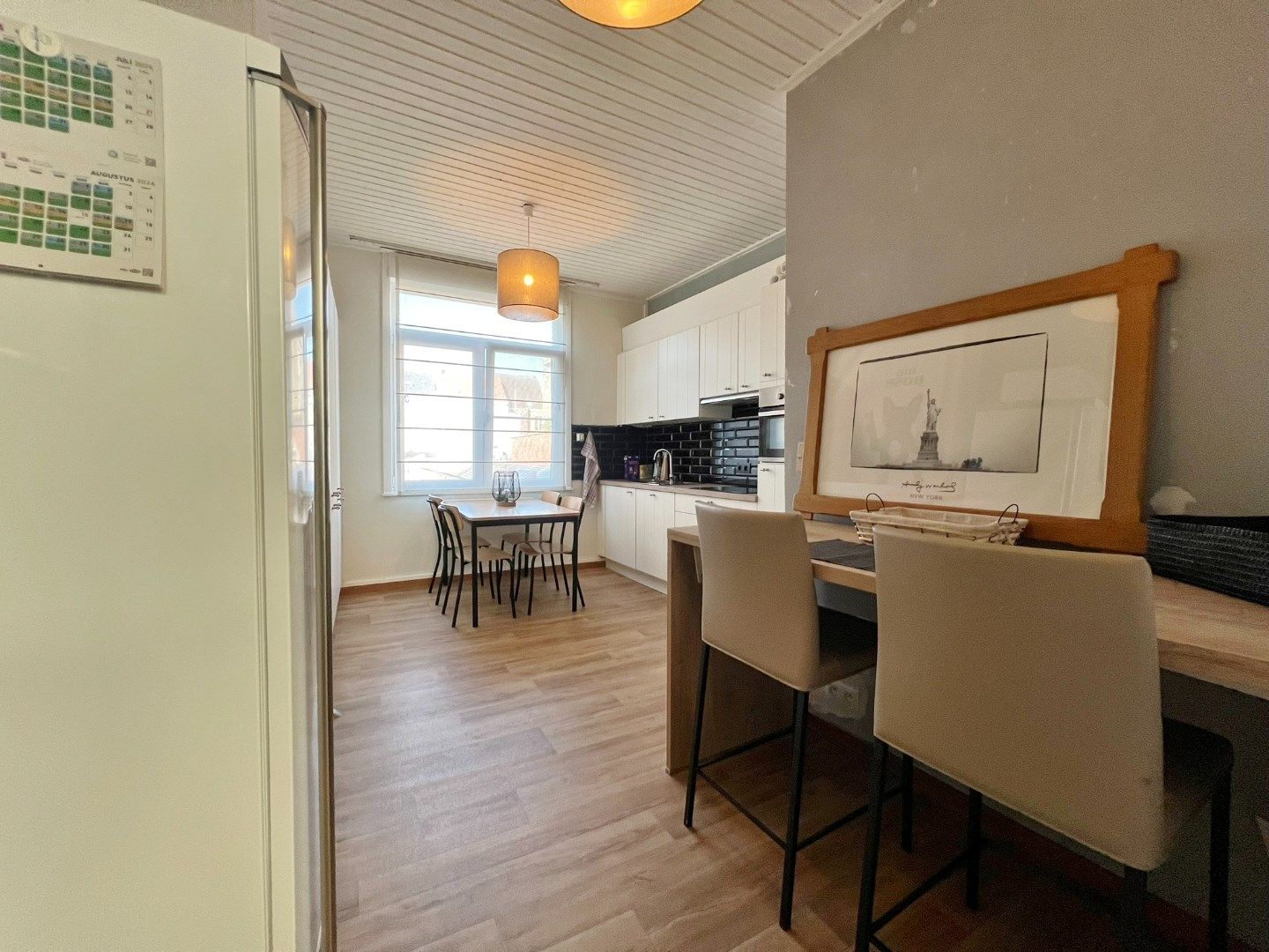 Opbrengsteigendom met duplex-appartement en studio op topligging.  foto 6