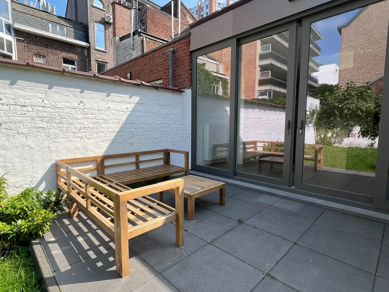 Gerenoveerd duplex appartement met tuin in centrum Leuven te huur foto 14