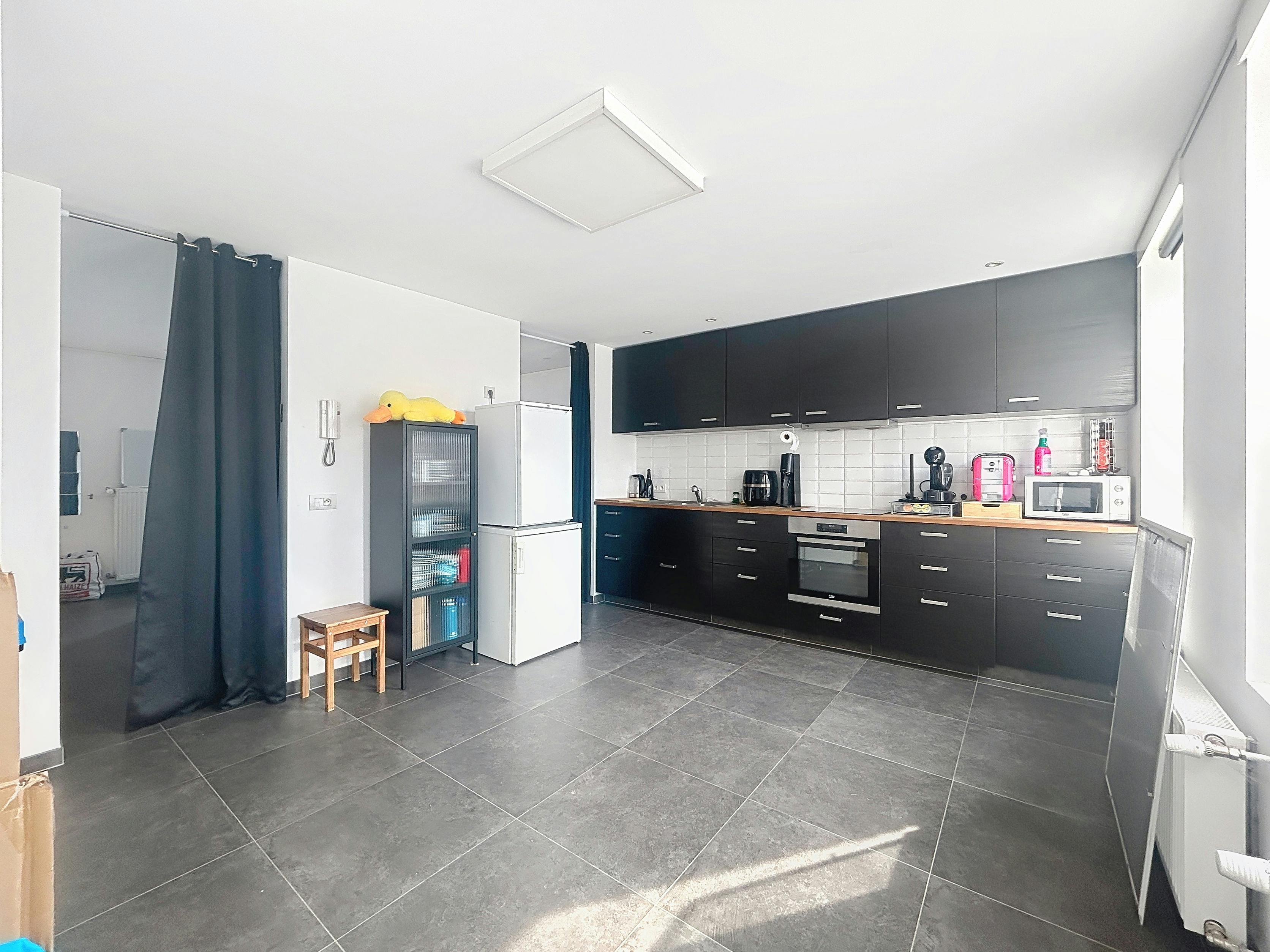 Gerenoveerd duplex appartement te huur in Waregem foto 6