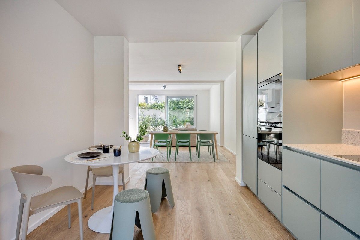 Aantrekkelijke gerenoveerde interbellum burgerwoning met vijf slaapkamers en stadstuin. foto 11