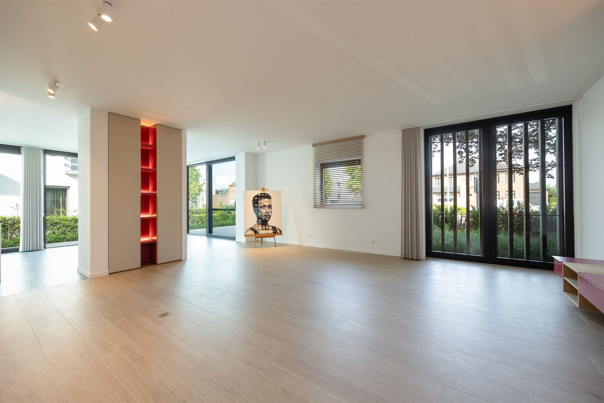 Lichtrijk en luxueus appartement met omvattende tuin foto 3