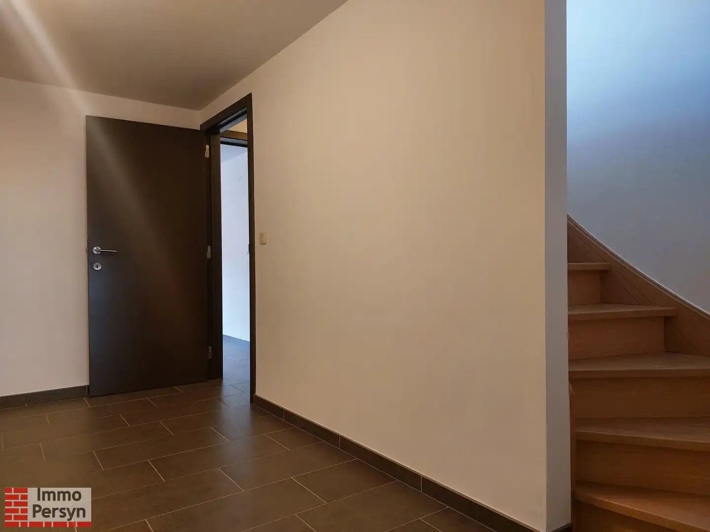 Gezellige rijwoning met kleine stadstuin foto 18