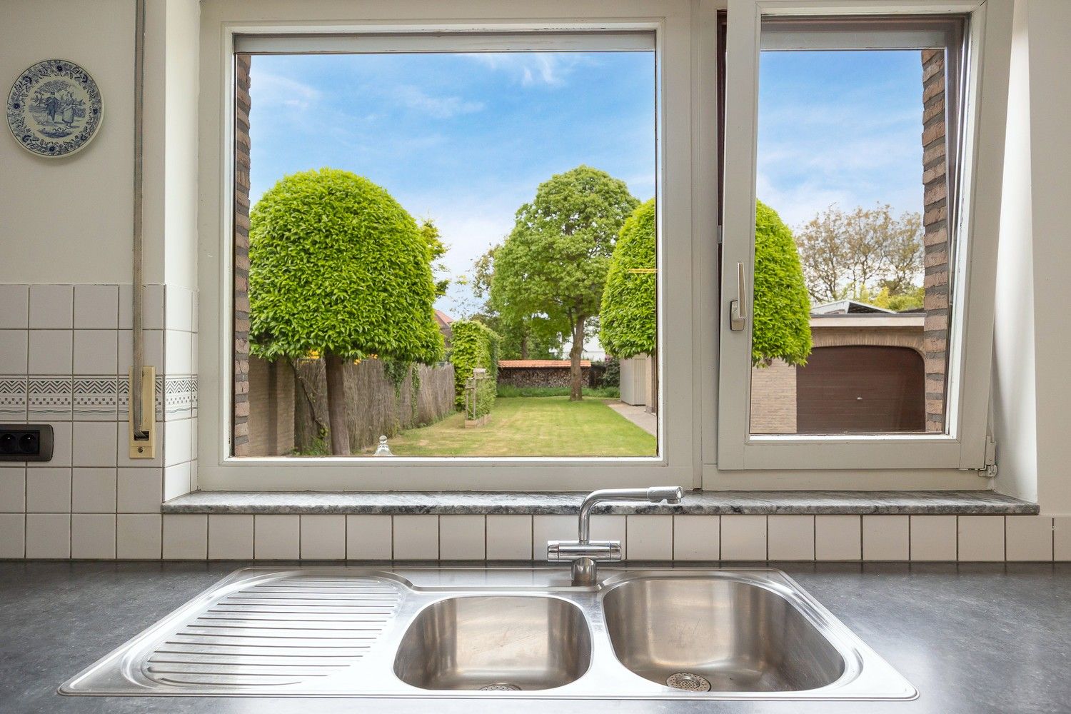 Instapklare, ruime woning met 4 slaapkamers, zonnig terras en multifunctioneel bijgebouw foto 9