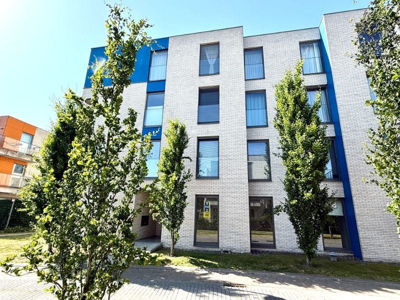 Centraal gelegen, gelijkvloers appartement met 2 slaapkamers en ruim terras met zicht op de Leie foto 2