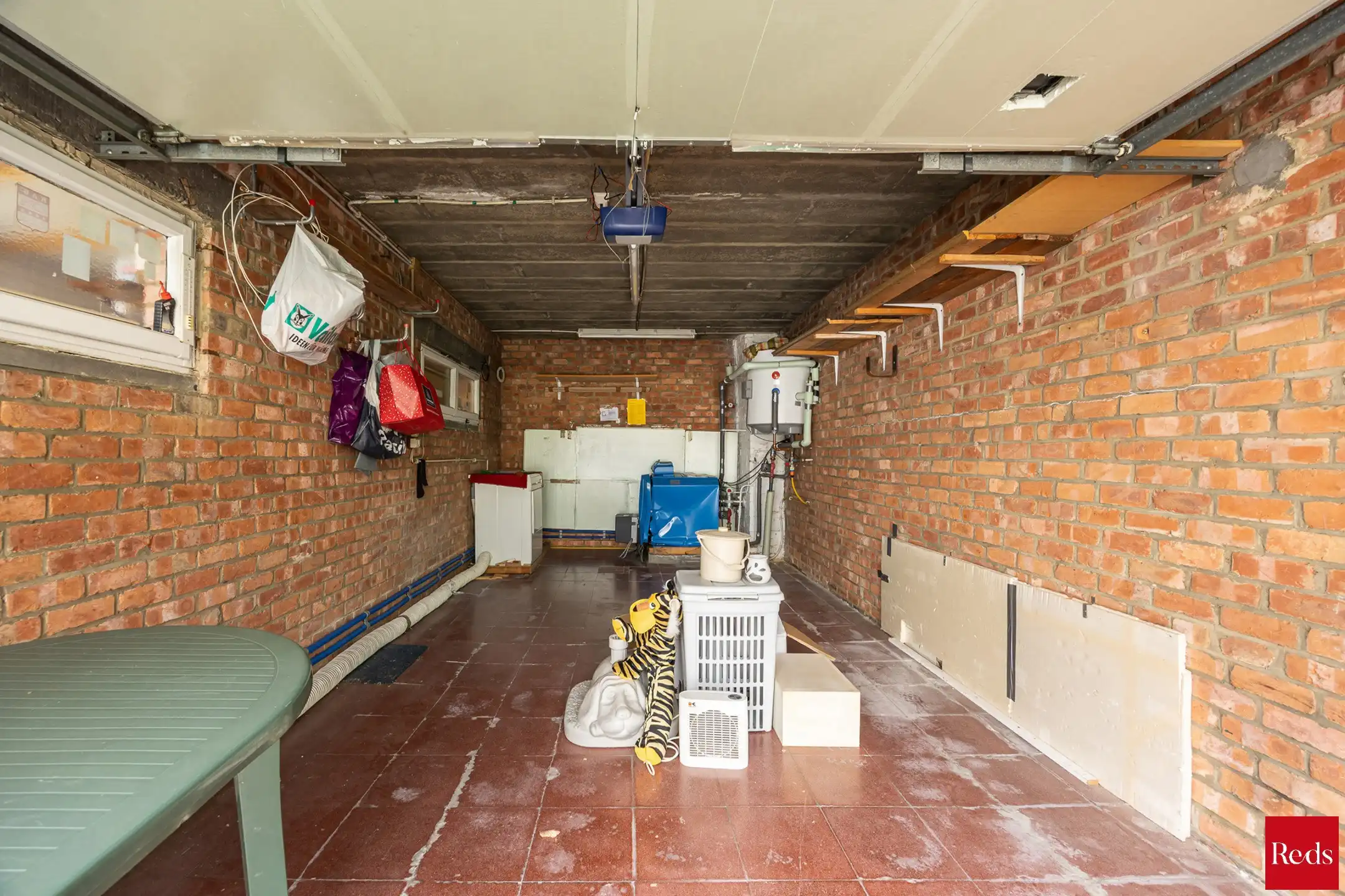  Halfopen bebouwing met tuin en garage foto 19