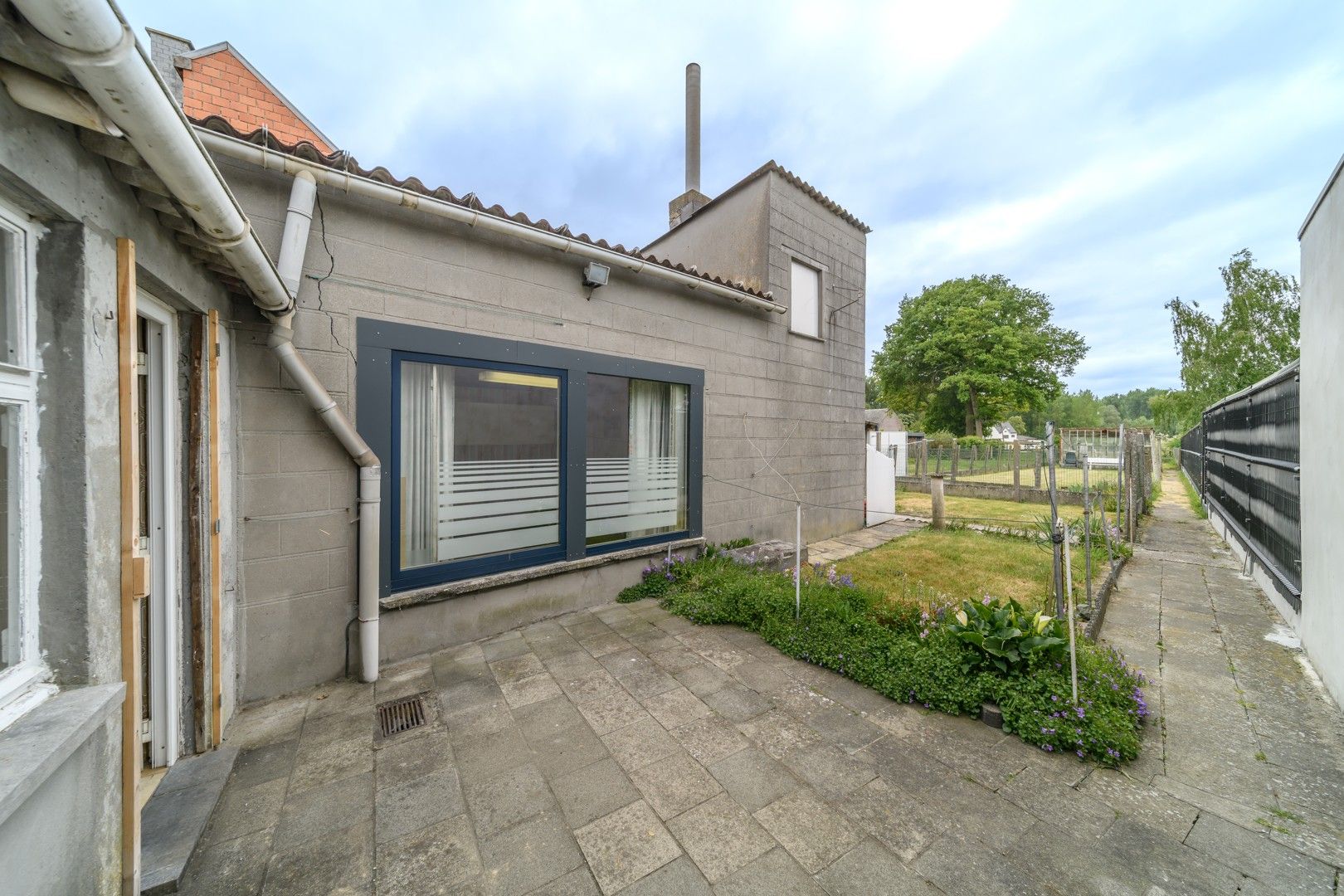 Te renoveren gezinswoning met tuin te Mere foto 13