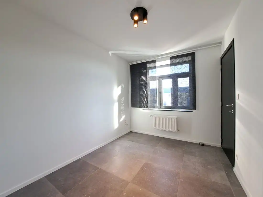 Instapklaar ruim duplex appartement te Rekem foto 12