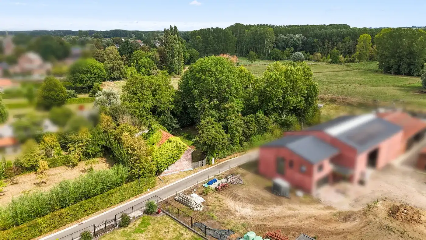 Open bebouwing in Linter met groot perceel en tuin foto 30