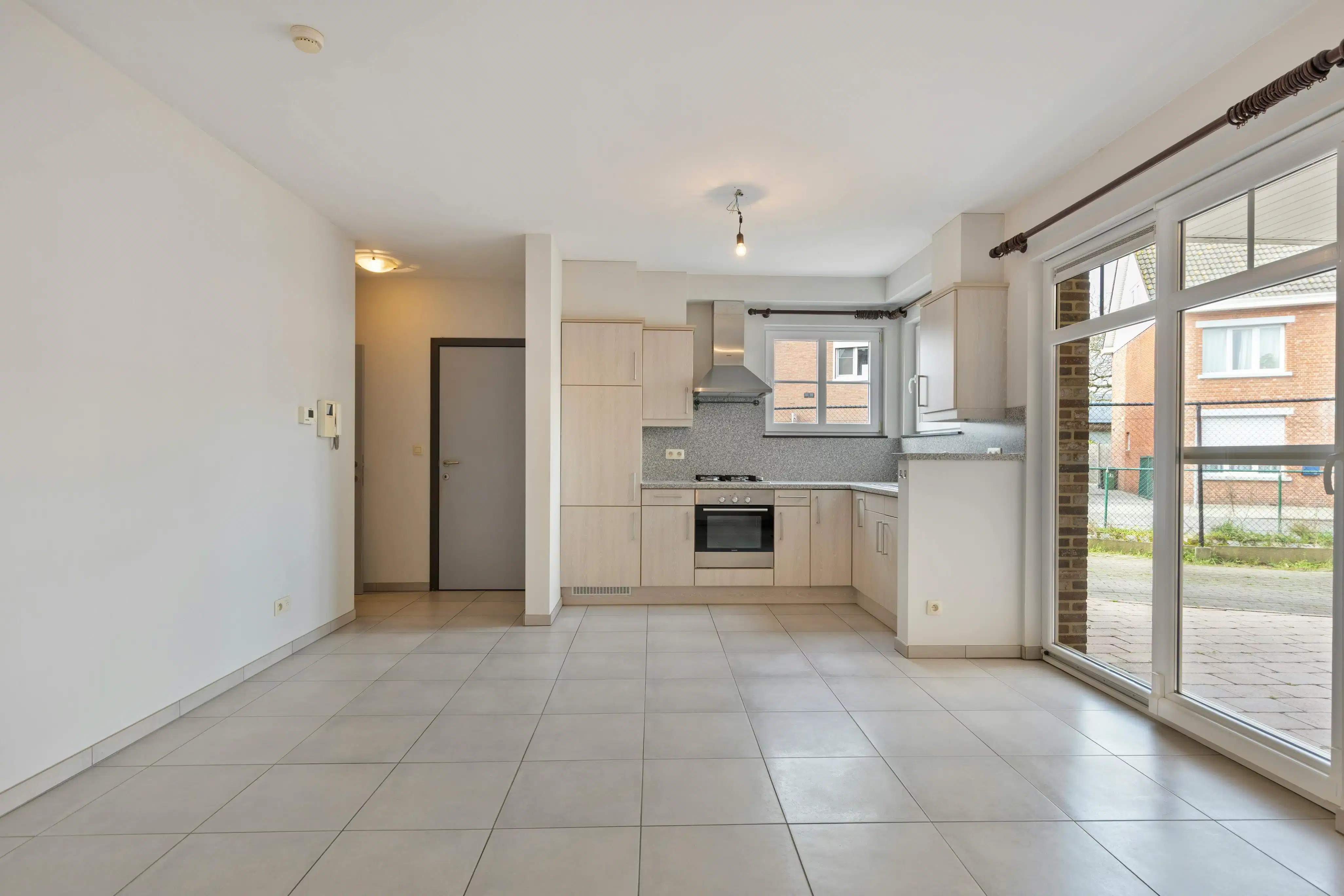 Instapklaar gelijkvloers app met terras en autostaanplaats! foto 5