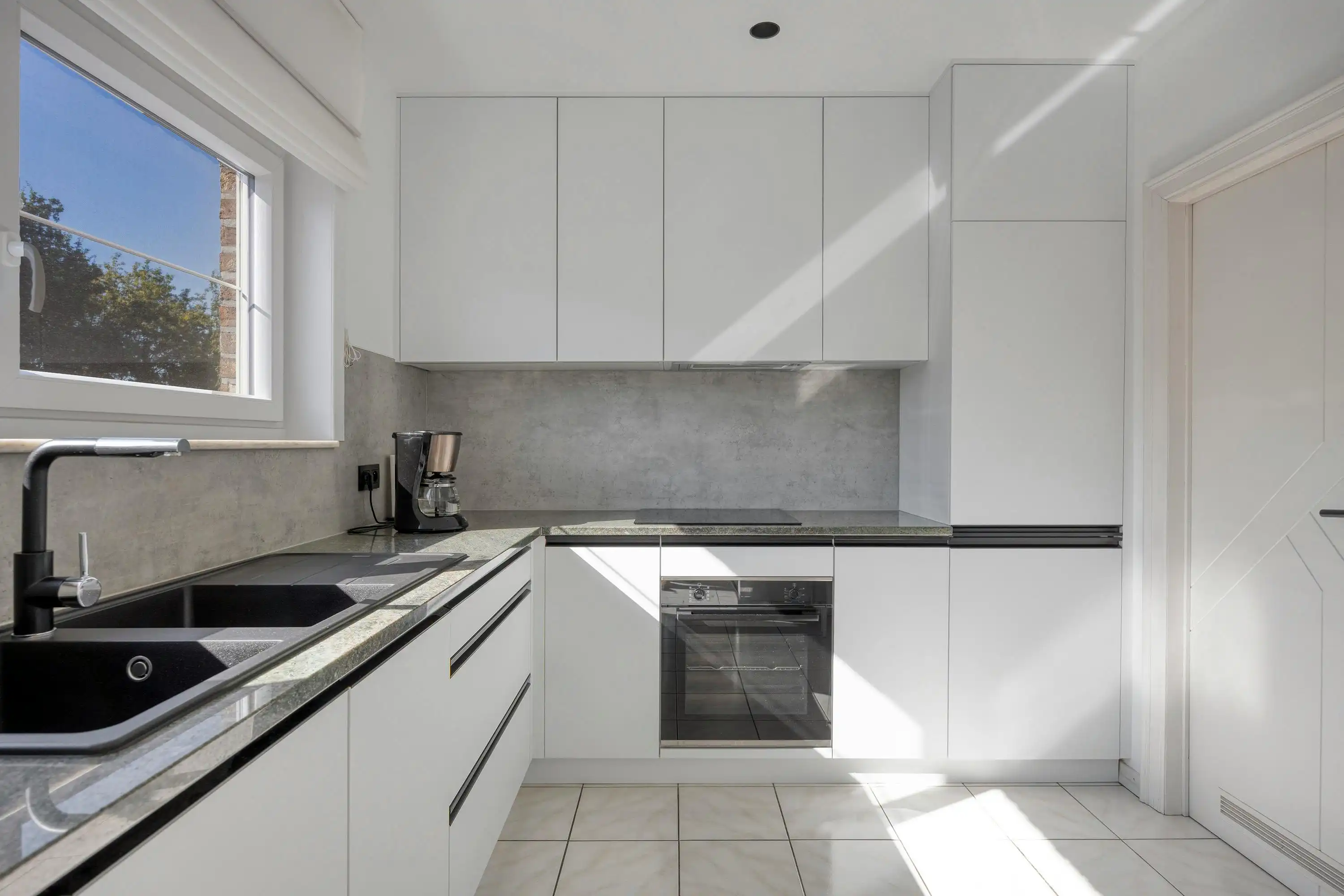 Appartement met 2 slaapkamers, terras en garagebox te koop in Hoboken foto 5