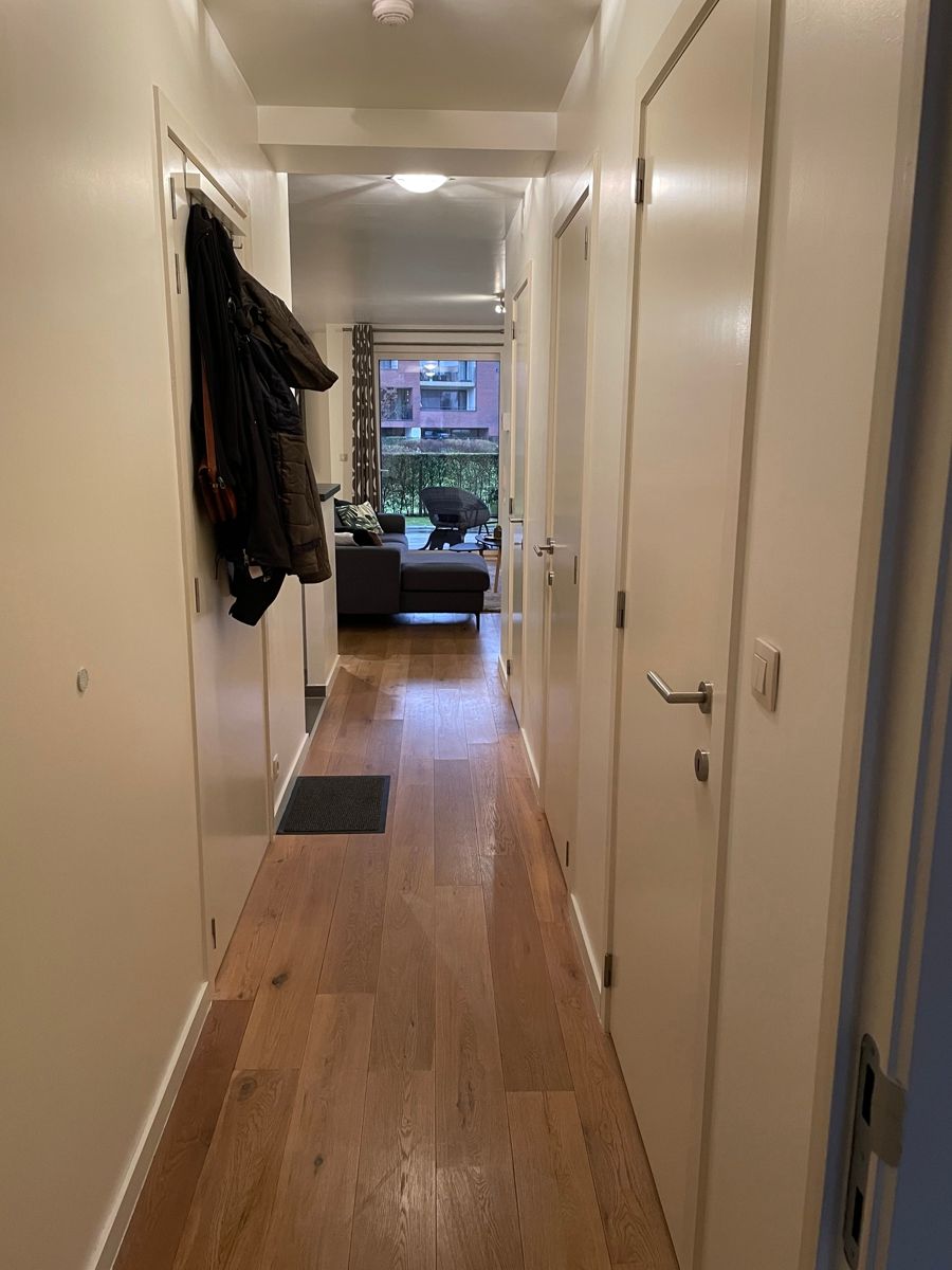 Gelijkvloers appartement met 1 slaapkamer, terras en tuintje foto 11