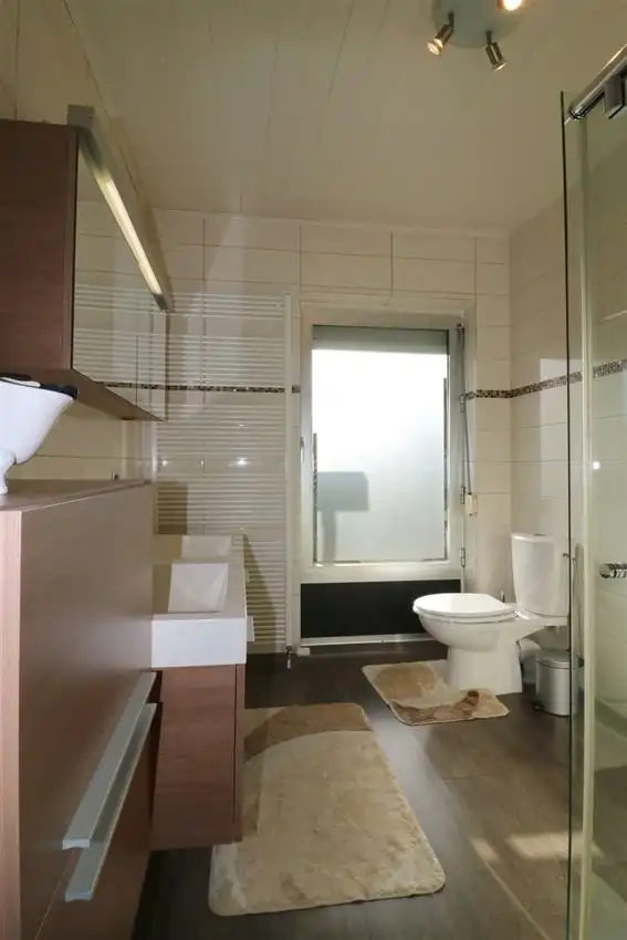 Rustig gelegen gelijkvloerse woning met drie slaapkamers foto 20
