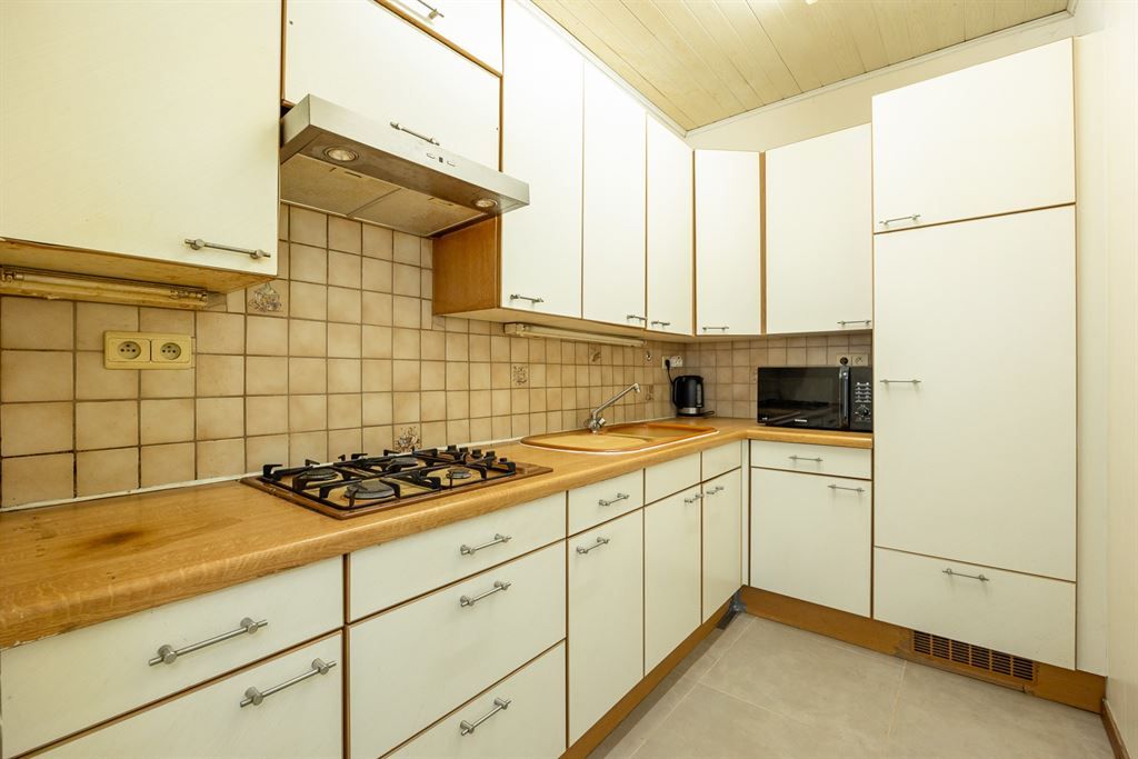 Gezellige woning met ruime garage en stadskoer foto 4