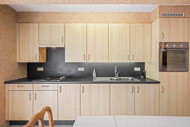 Gelijkvloers appartement met 2 slaapkamers, zonnig terras en een zeer ruime garage! foto 3