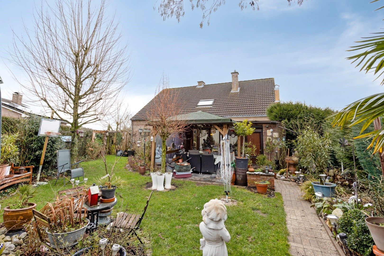 Verzorgde gezinswoning met 3 slaapkamers en inpandige garage - landelijke ligging foto 25