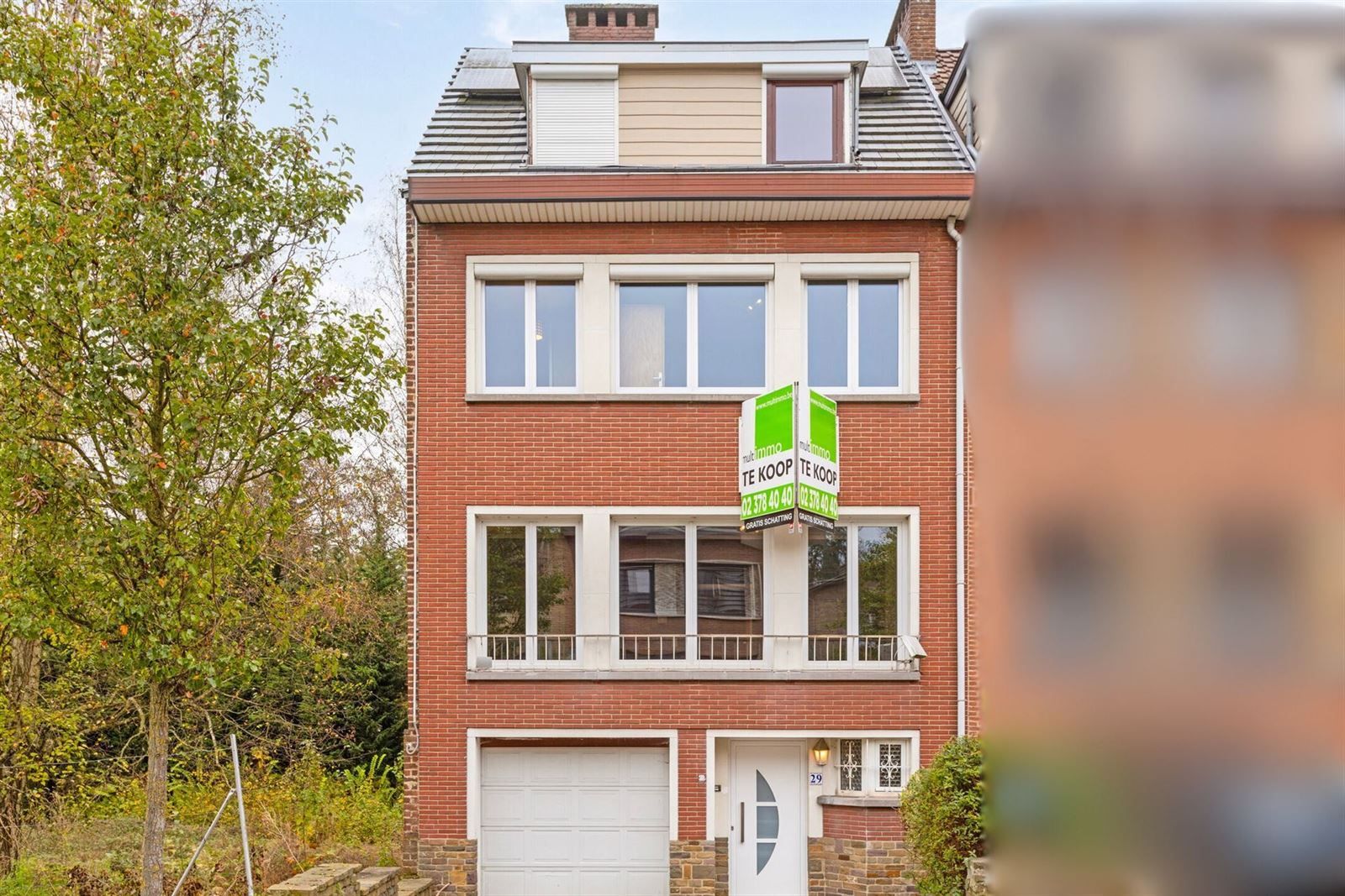 Woning met 4 slaapkamers, tuin en garage foto {{pictureIndex}}