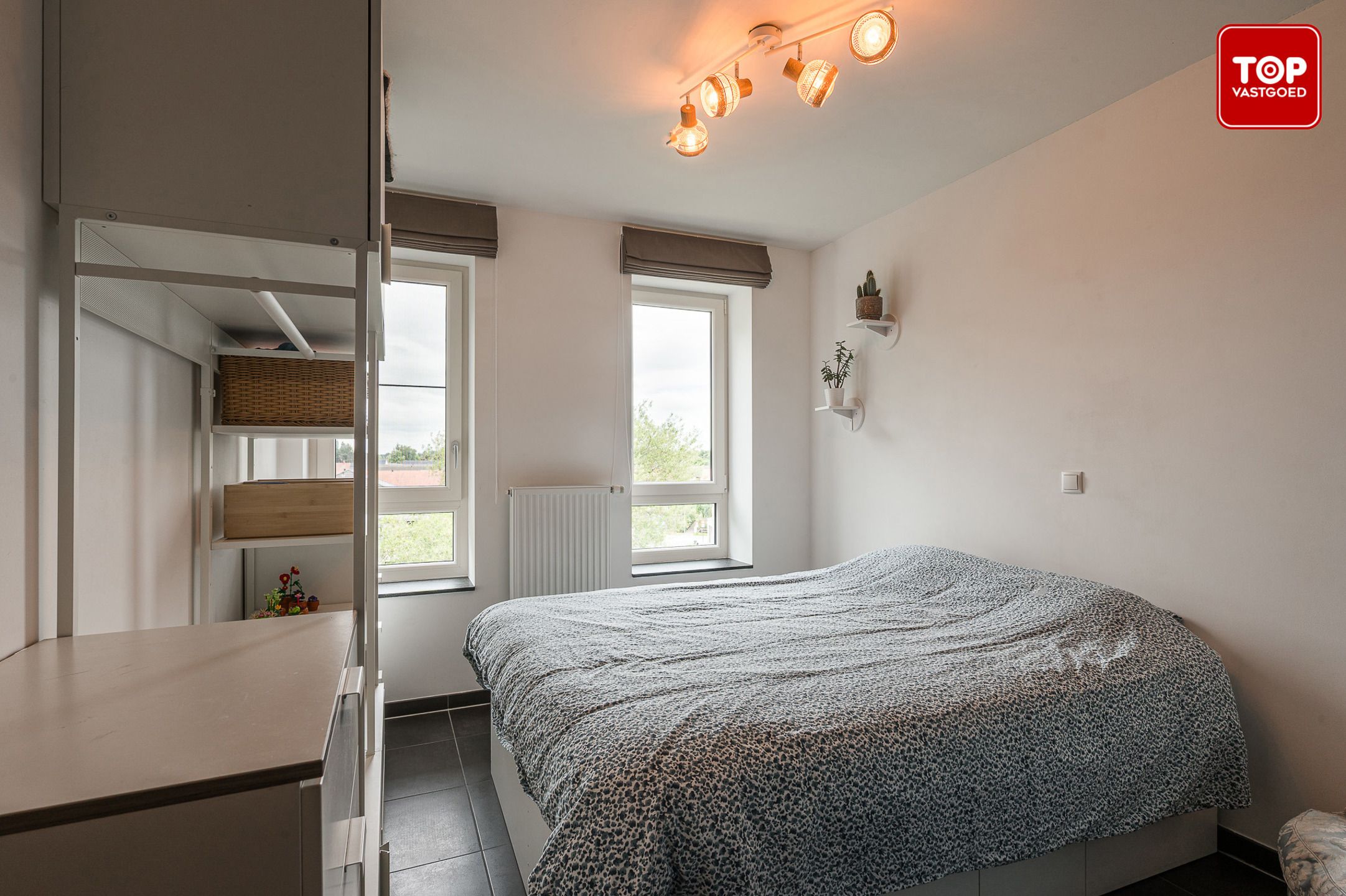 Instapklaar 1-slaapkamer appartement met autostaanplaats en fietsenberging.  foto 14