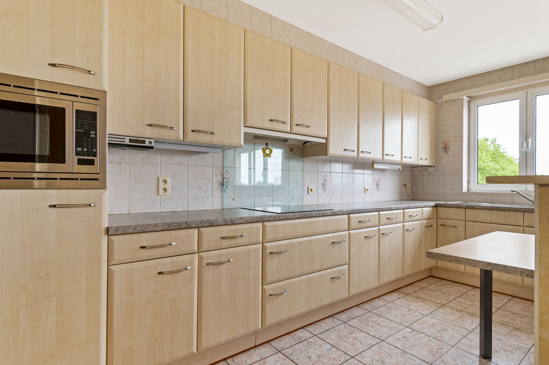 Prima onderhouden app met 2 kamers en terras foto 7