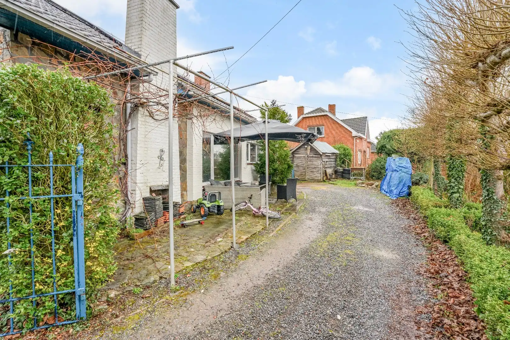 Op te knappen karakteristieke hoekwoning, 4 slpk, (EPC-label C) gelegen aan het Haspengouwse landschap. foto 10