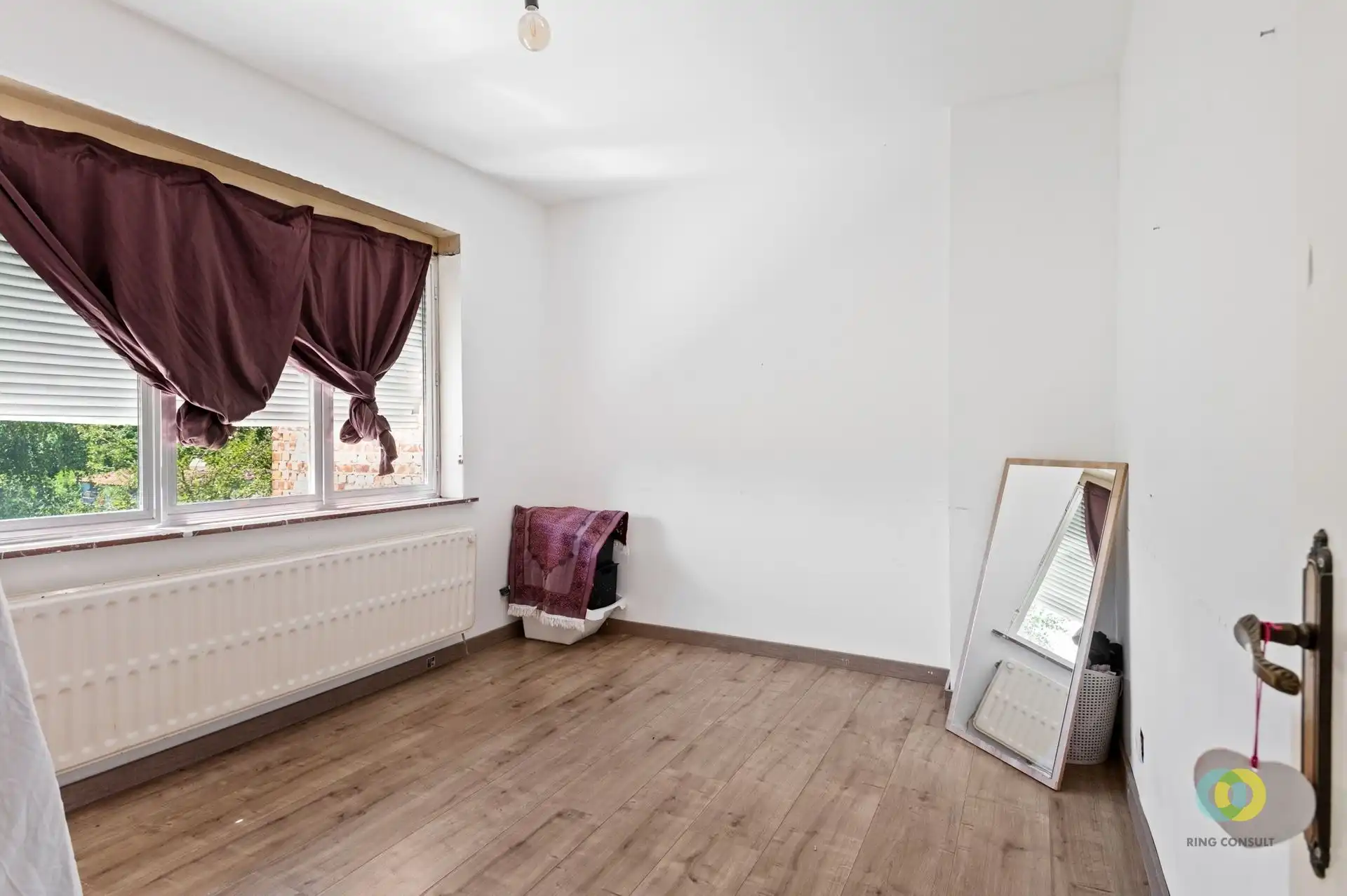 Bel-etagewoning met garage en tuin foto 11