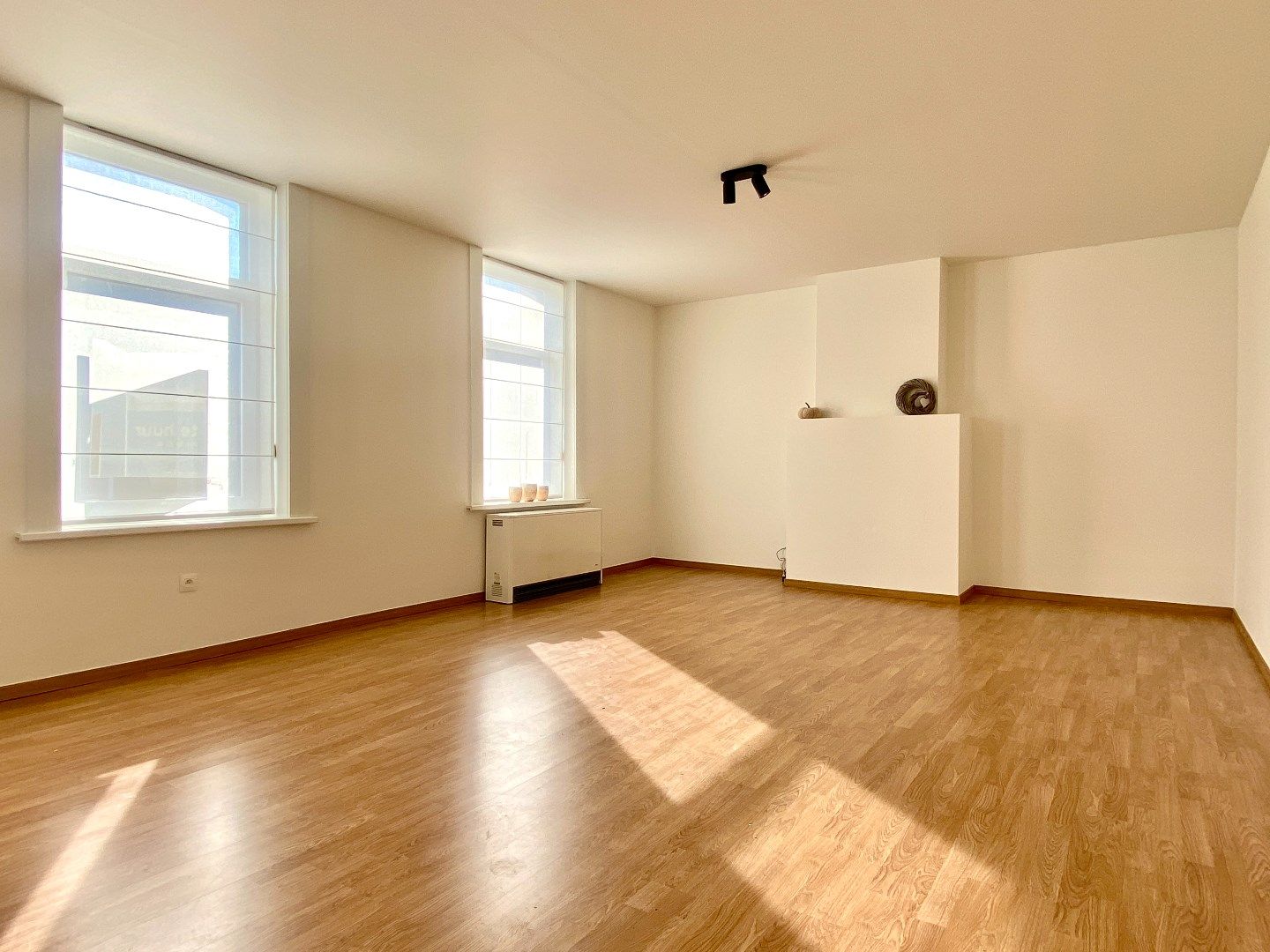 Ruim 1-slaapkamerappartement met veel lichtinval in het centrum van Kuurne foto 4