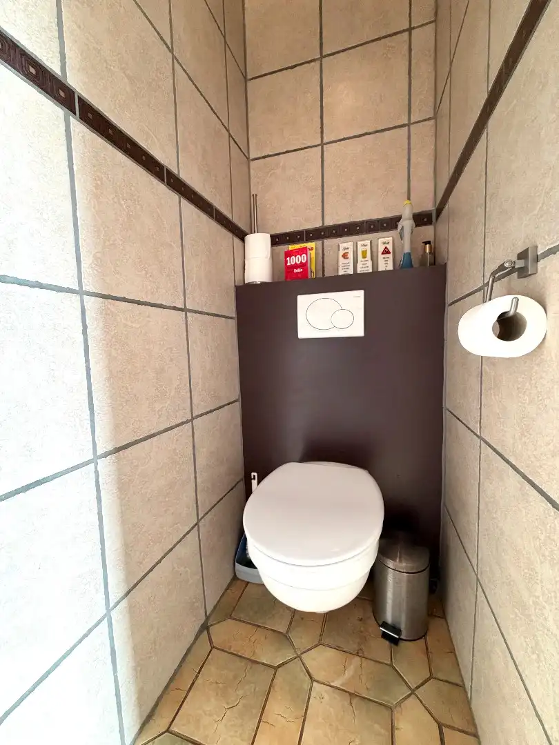 Gelijkvloerse woning met ruime tuin te koop op 720 m² in De Wijnberg te Wevelgem foto 3