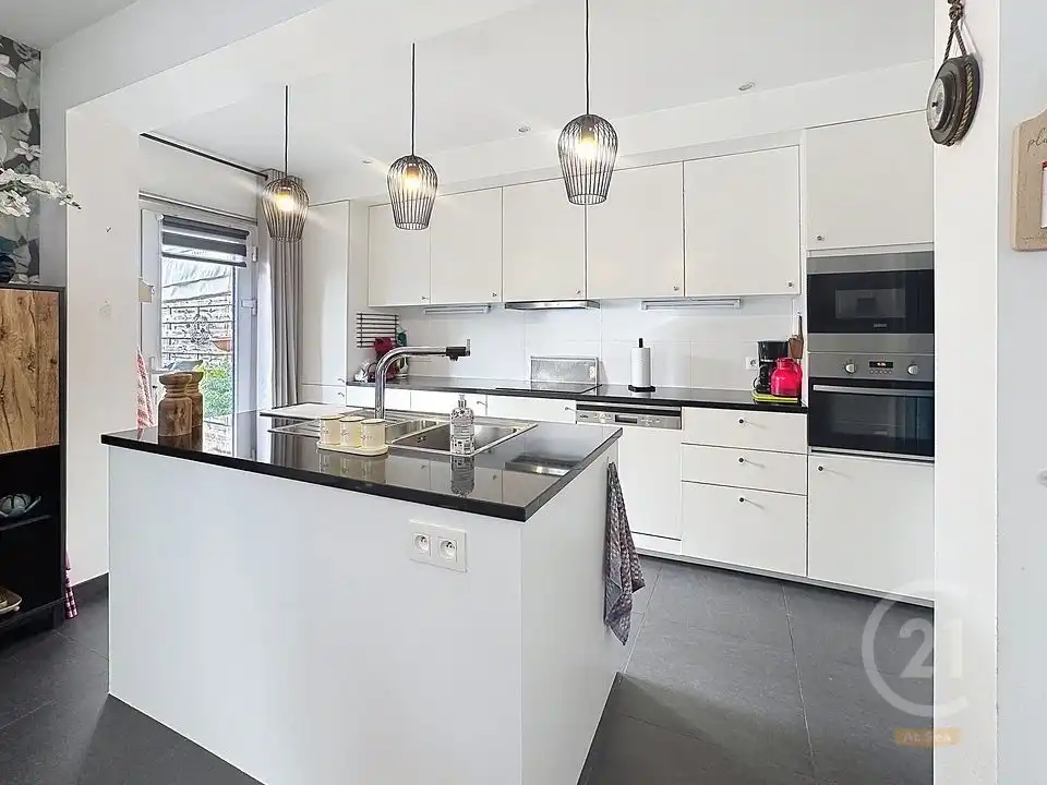 Instapklare woning met 3 slaapkamers en garage in Lombardsijde foto 2