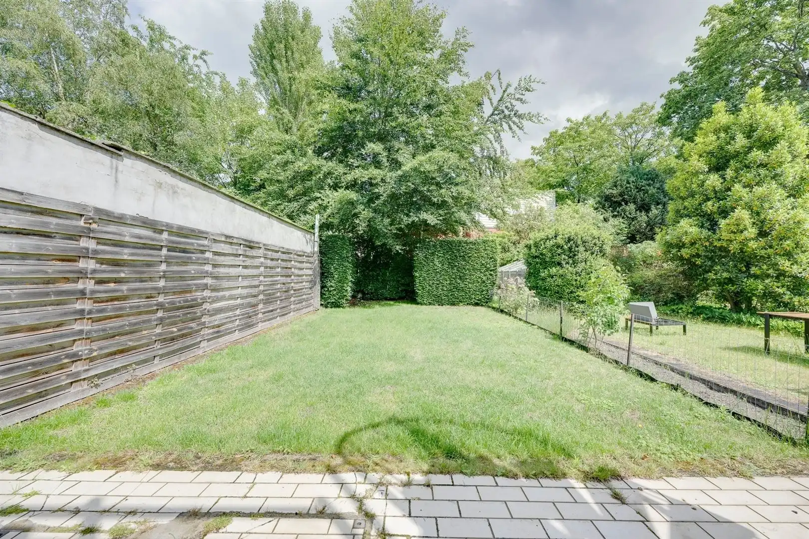 Toffe gezinswoning met 4 slaapkamers, 2 badkamers, garage en tuin foto 32