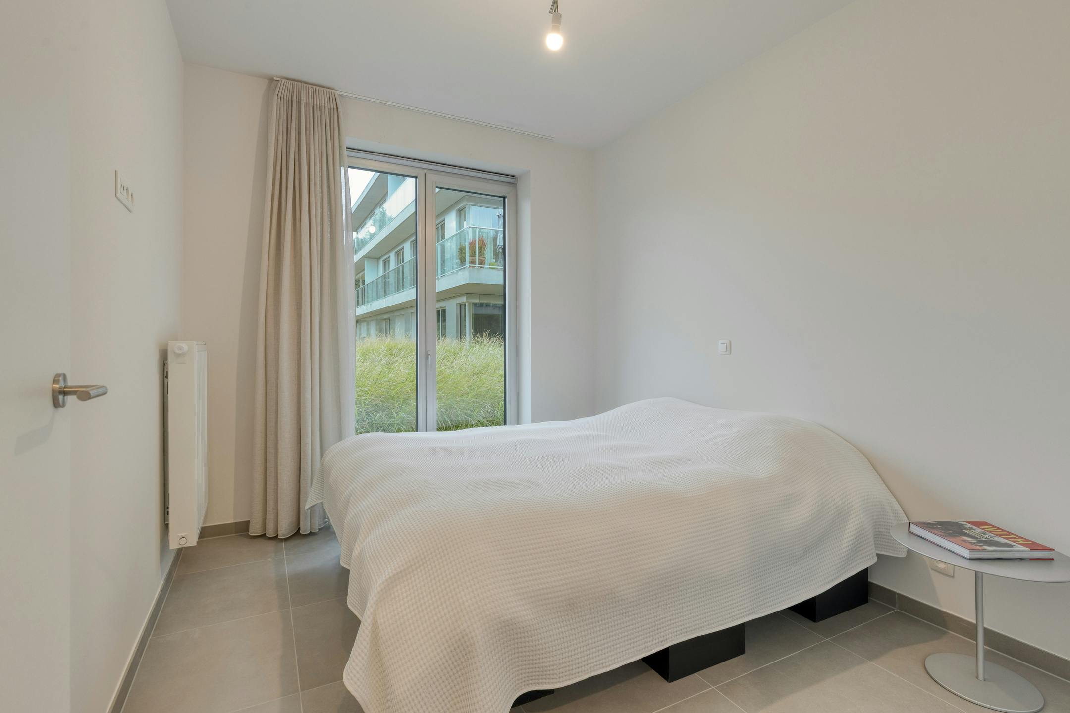 Instapklaar appartement in parktuin nabij hartje Roeselare! foto 12