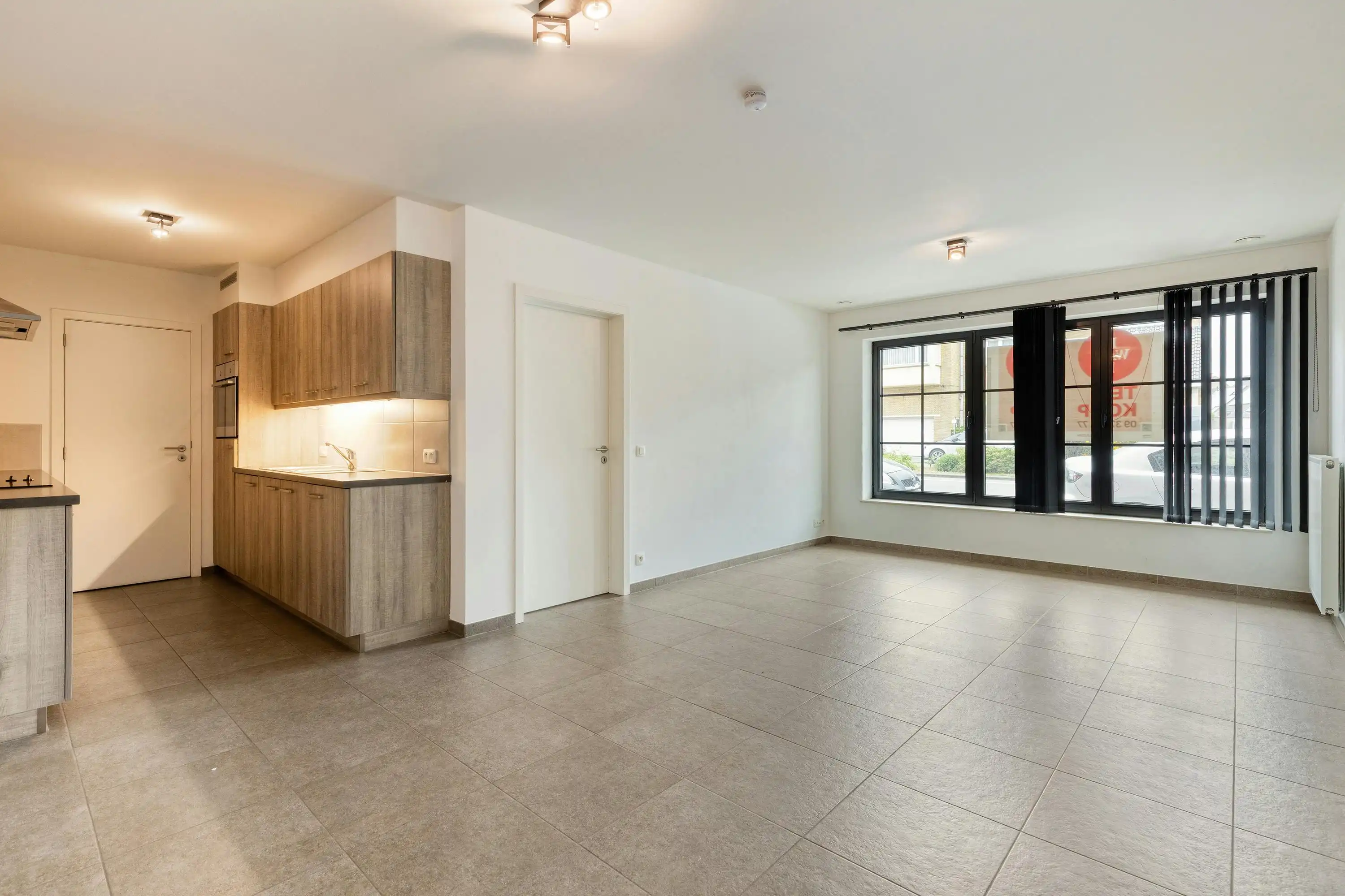 Instapklaar 1-slaapkamerappartement met garagebox in centrum Eeklo foto 3