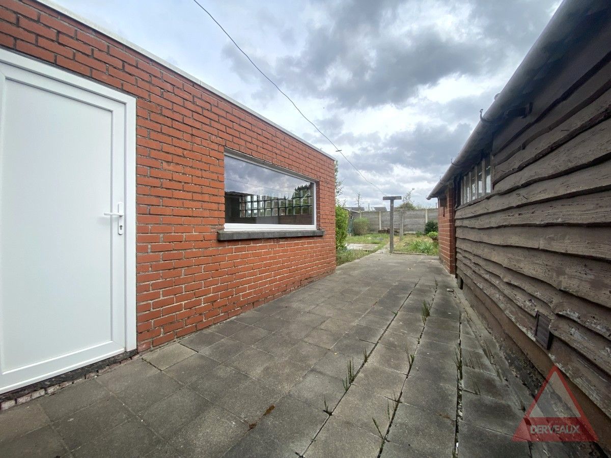 Passendale – Te renoveren woning met tuin, garage en vaste trap naar zolder foto 10