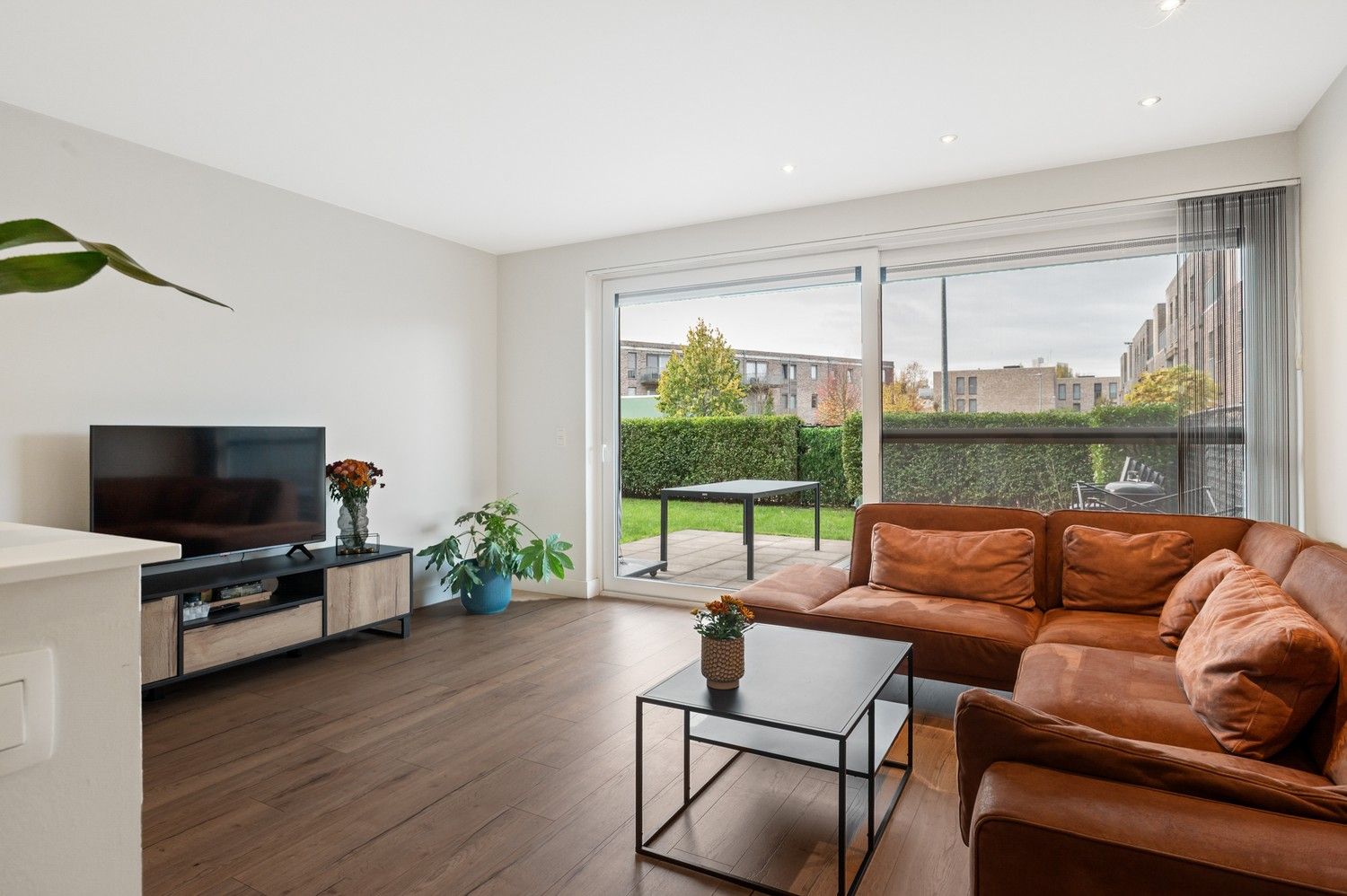 Recent gelijkvloers appartement met 2 slpks, grote tuin & autostaanplaats in Schoten! foto 2