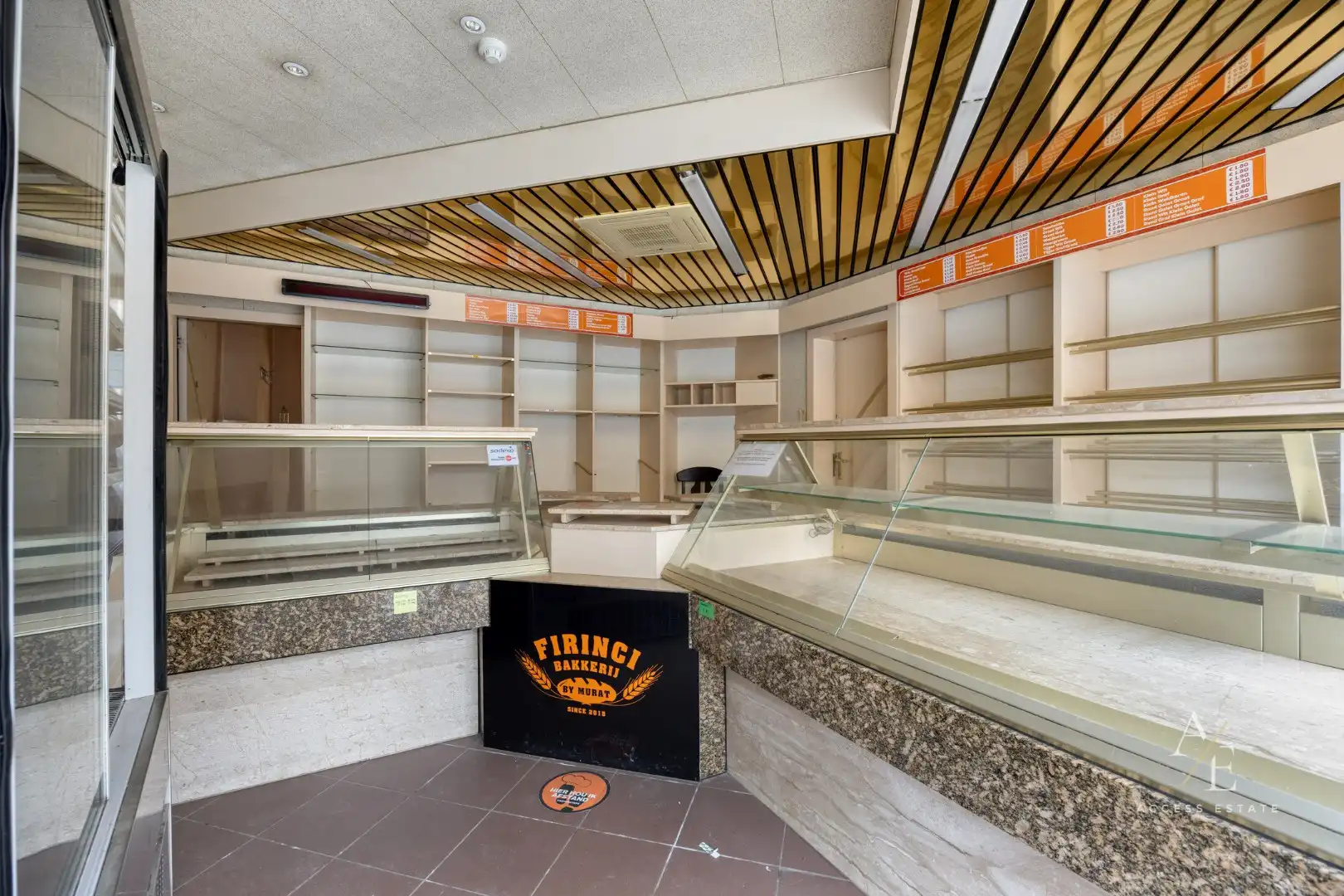 Veelzijdig te renoveren eigendom met tuin en 2 garages en achterdoorgang in Temse foto 5