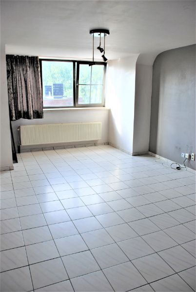 Dakapp. in het centrum met garage en 2 slpkms foto 3