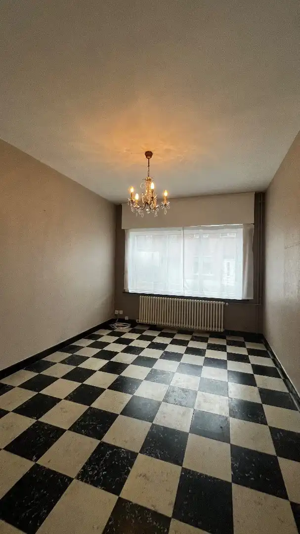 Grote woning met mogelijks vier kamers, garage en ruime tuin foto 2