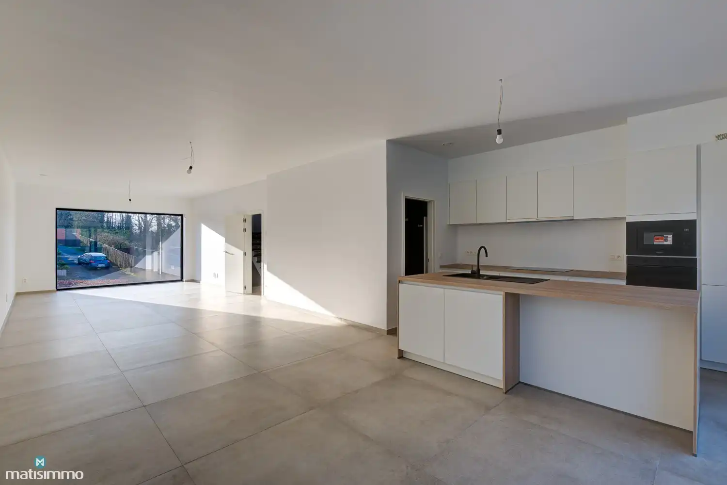 VOLLEDIG AFGEWERKTE EN GESCHILDERDE NIEUWBOUWWONING (EPB E10) MET 3 SLAAPKAMERS, OVERDEKT TERRAS, 2 GARAGES, KELDER EN AANGELEGDE TUIN IN WERM foto 7