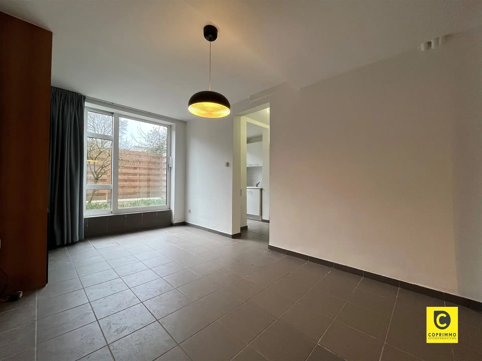 Gelijkvloerse studio op rustige ligging met terras foto {{pictureIndex}}