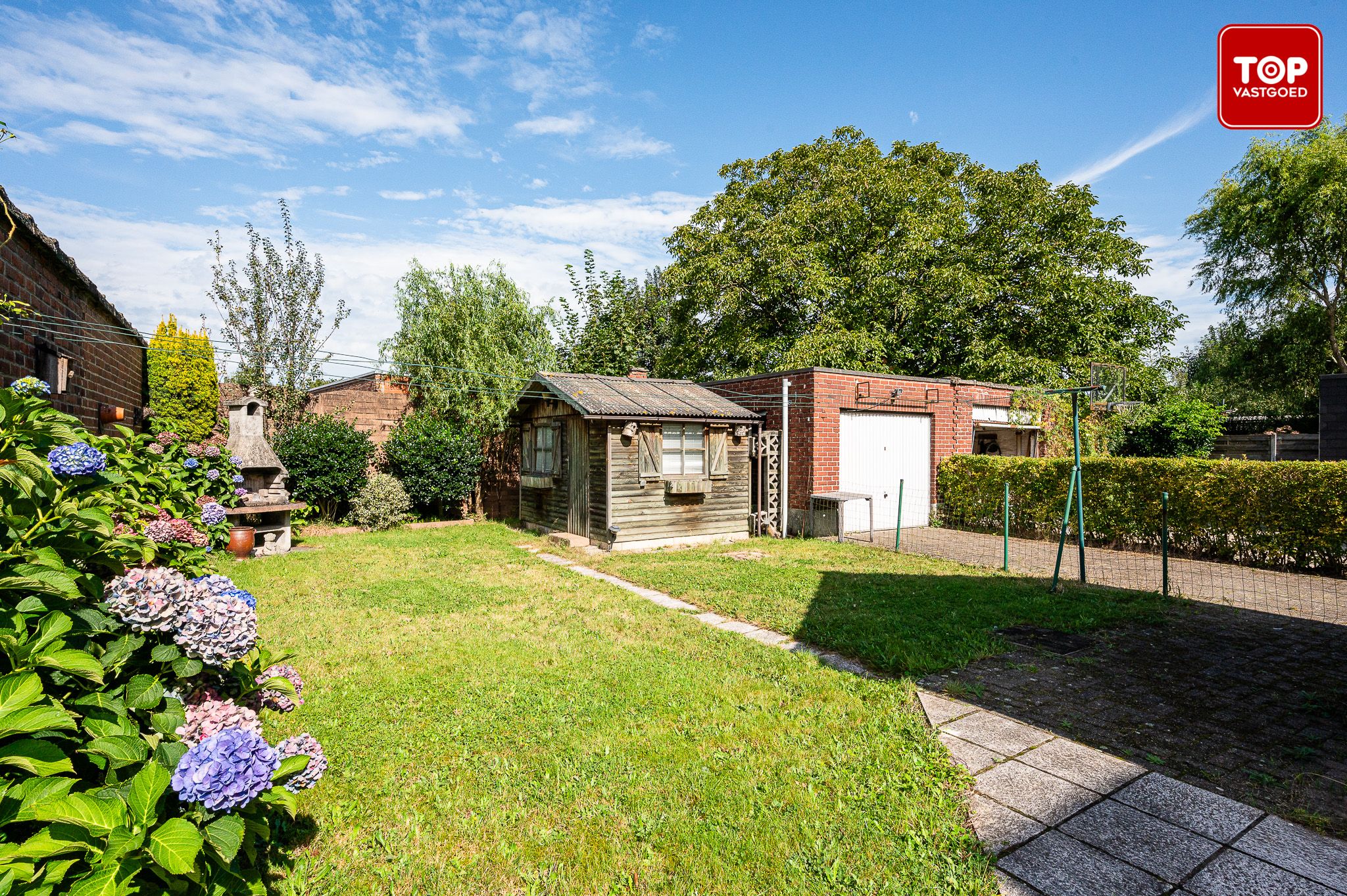 Te renoveren vrijstaande woning met zuidwest gerichte tuin foto 3