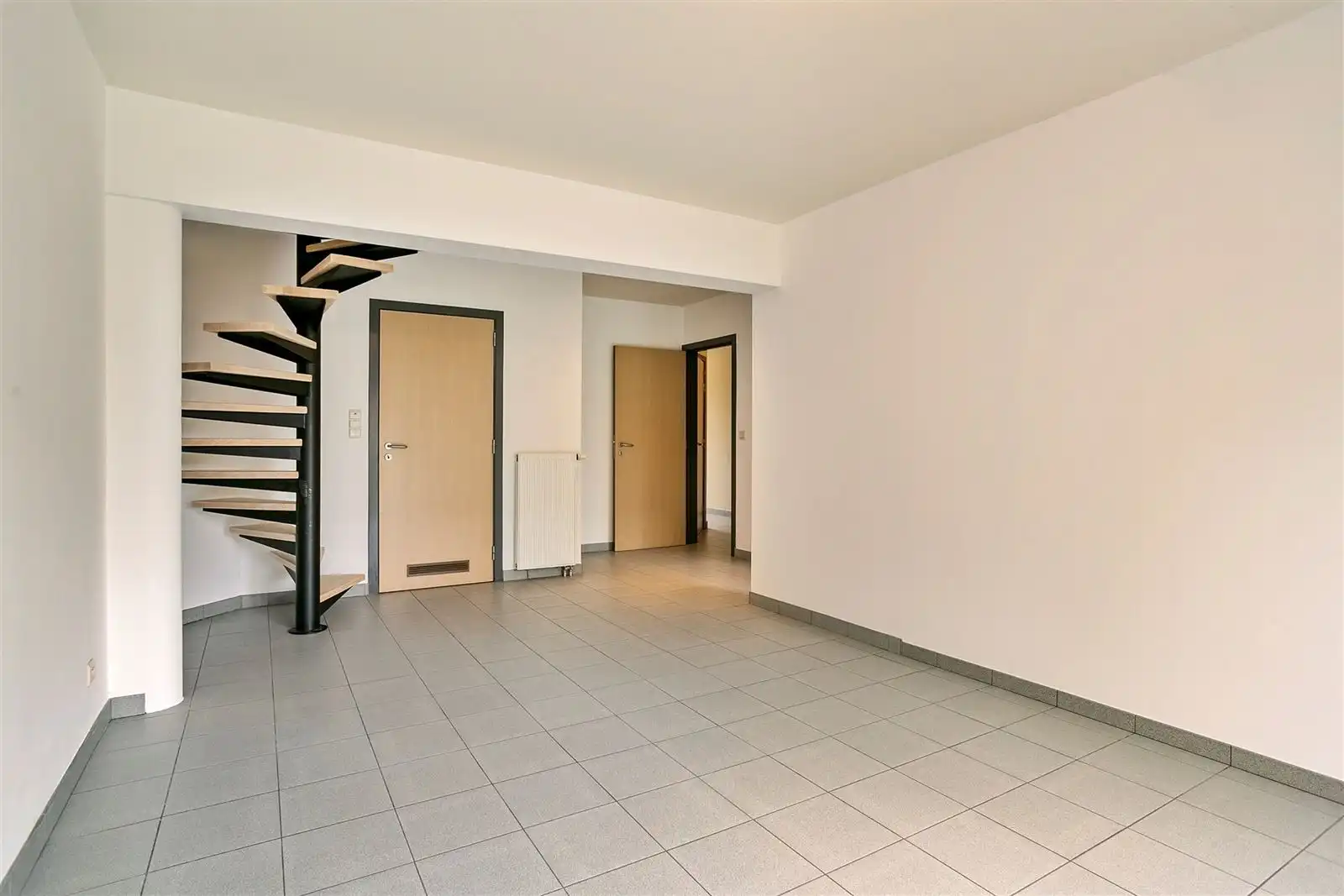 Gunstig gelegen duplex-appartement met inpandige garage en tuin foto 5