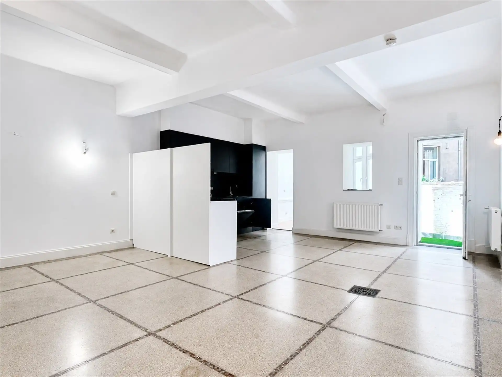 Gelijkvloers appartement met ruime stadstuin! foto 3