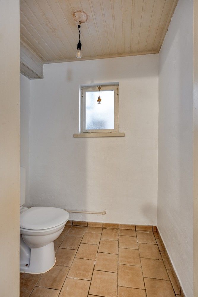 Charmante gezinswoning met 4 slaapkamers, tuin en veel potentieel in het gezellige Vlijtingen, Riemst. foto 17