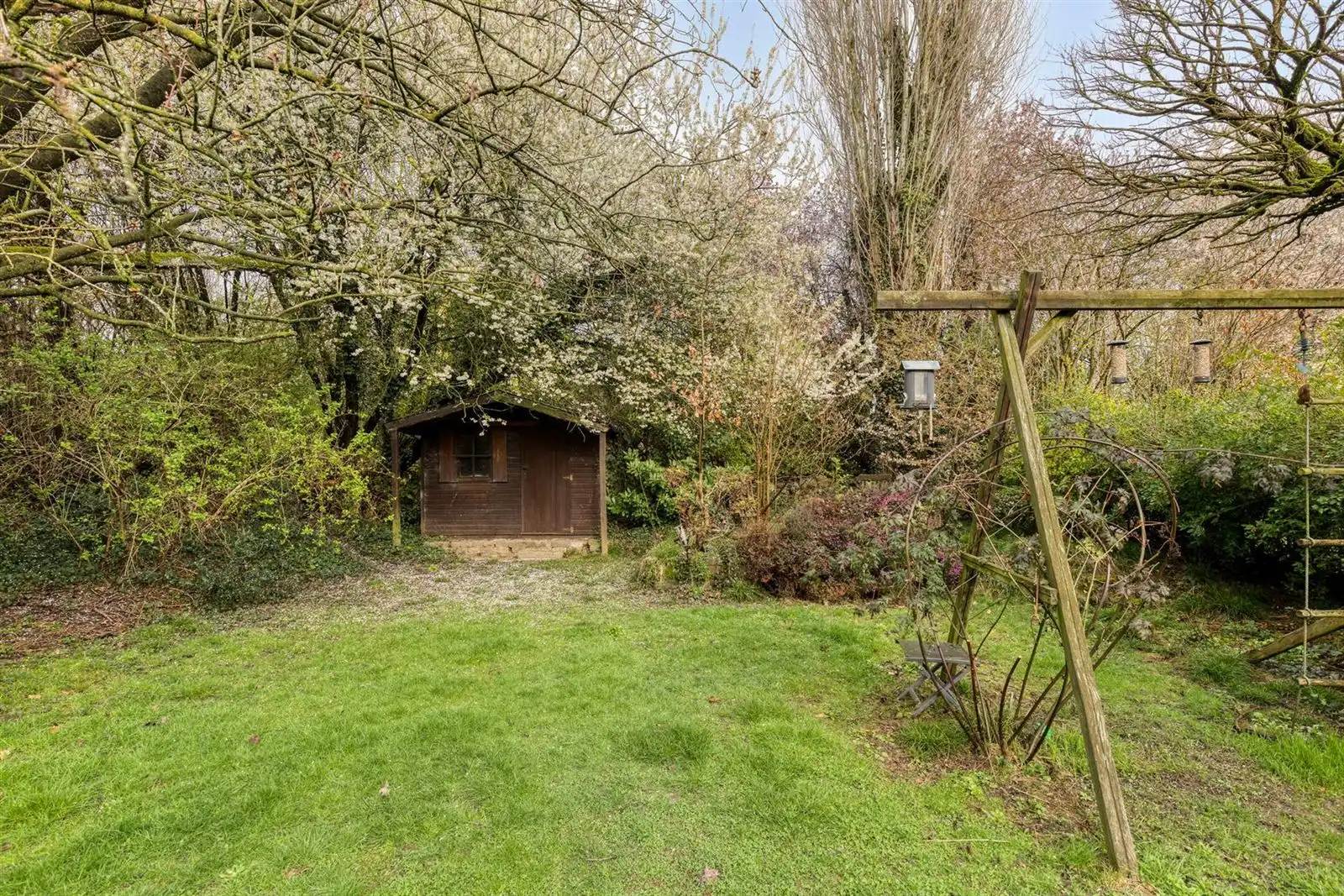 Gelijkvloers appartement (159m²) met prachtige tuin foto 22