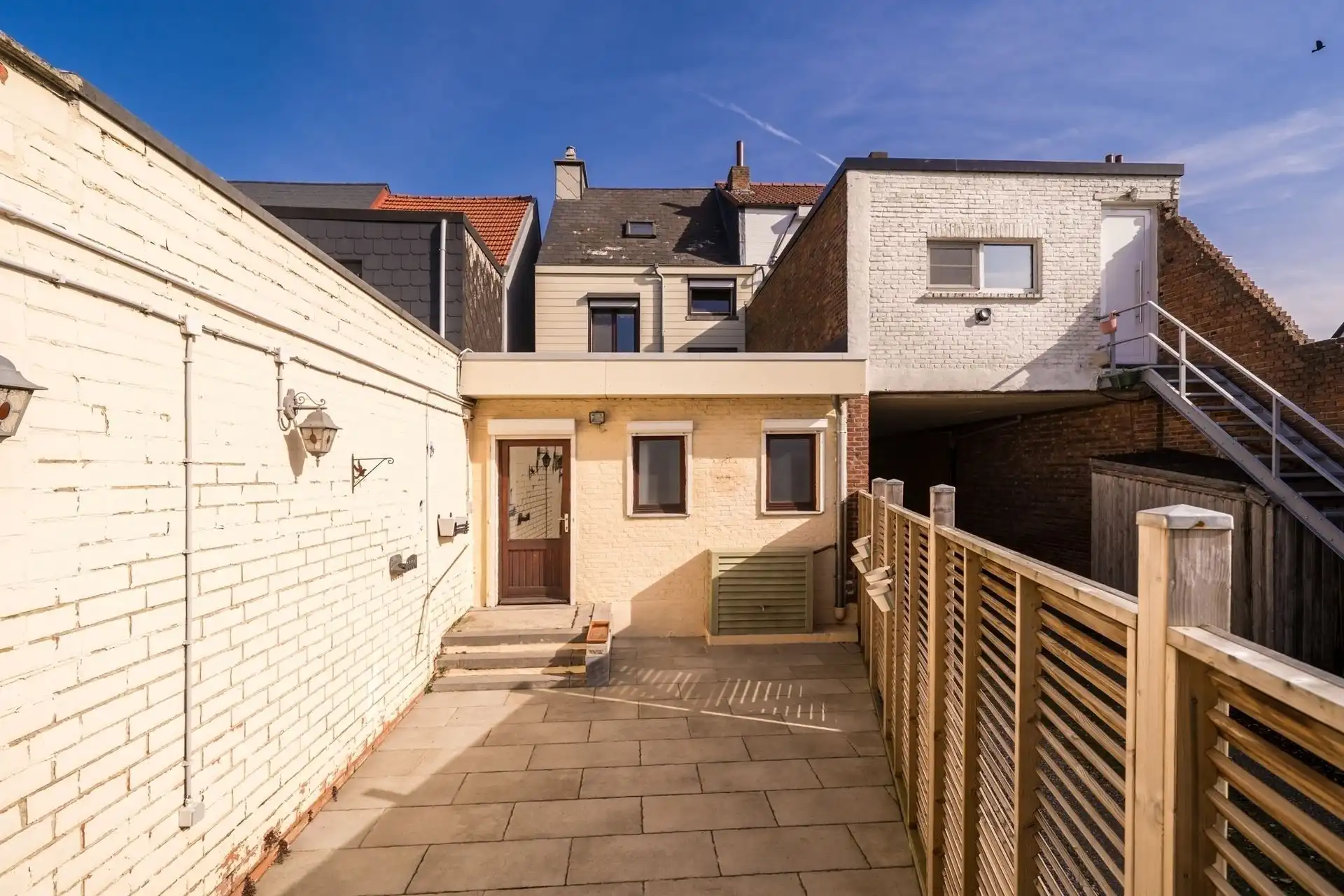 Eengezinswoning met 3 slpks en toegang via de tuin! foto 4