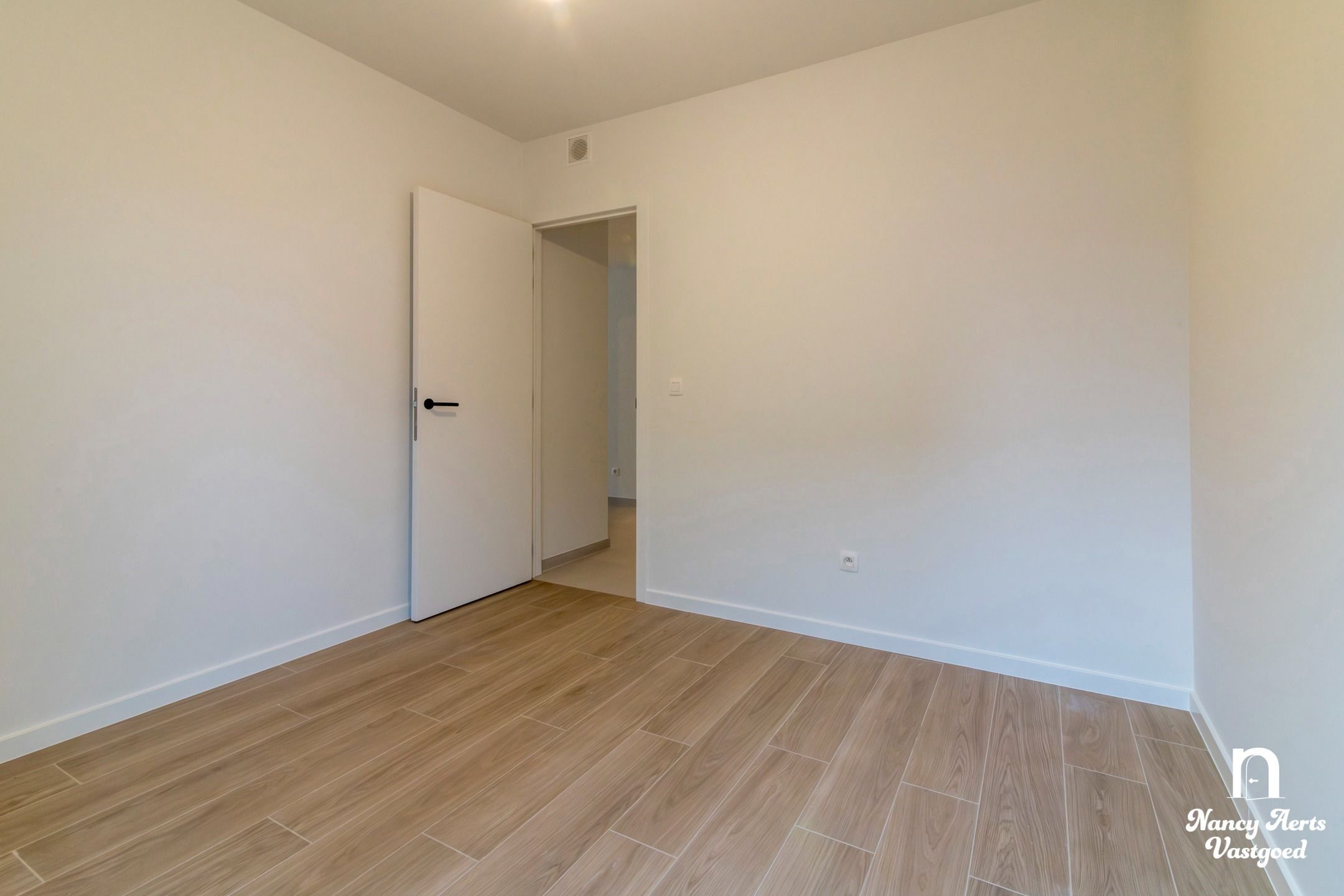 Nieuwbouwappartement met terras in het centrum van Beverlo foto 16